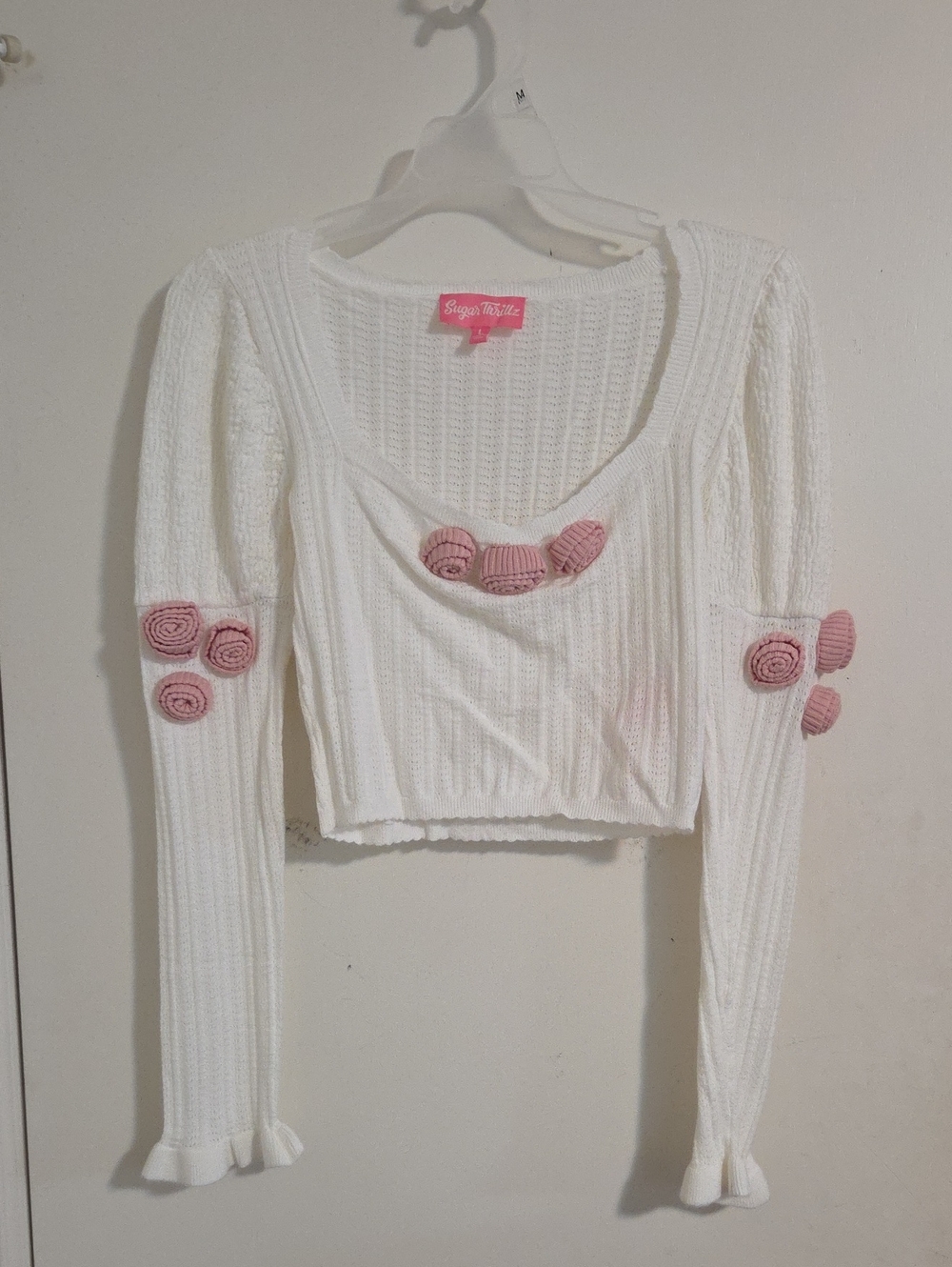 Sugar Thrillz White Cropped Knit Top with Pink Rosette Accents